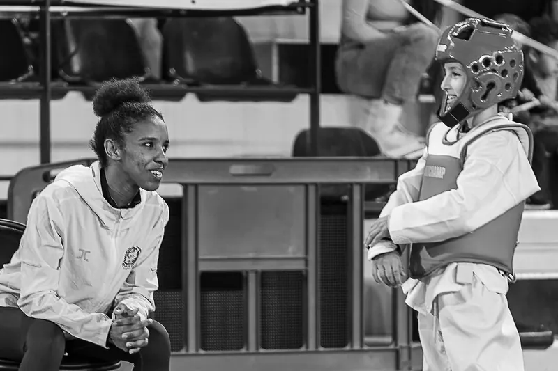 Émotion coach et athlète — © Lawrence Banahan / Combat Spirit Media
